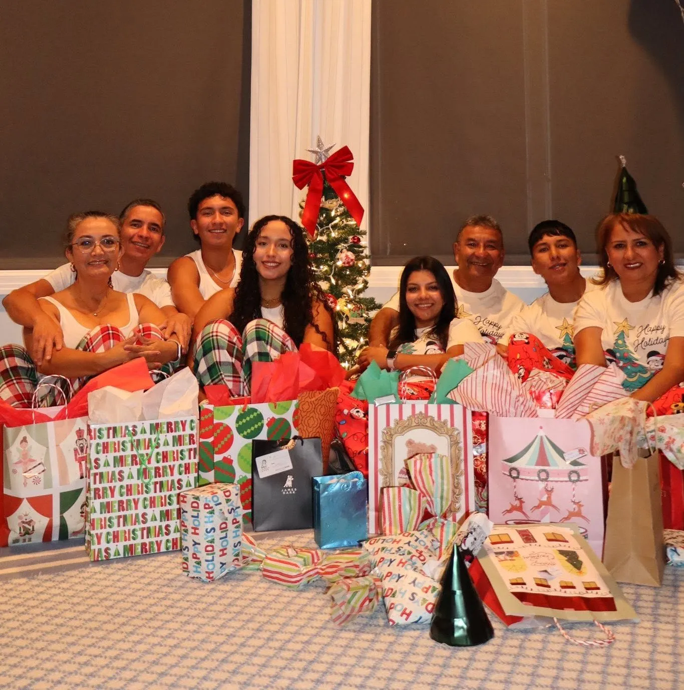 Family gathered around gifts during a celebration
